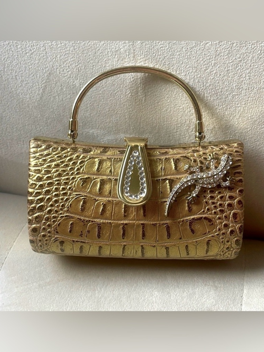 Iris Lane small gold clutch